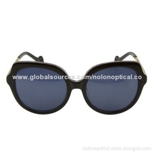 Oversize black tortoise sunglasses temple with hole deco